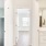 a room with a bed and a mirror