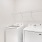 a washing machine in a room