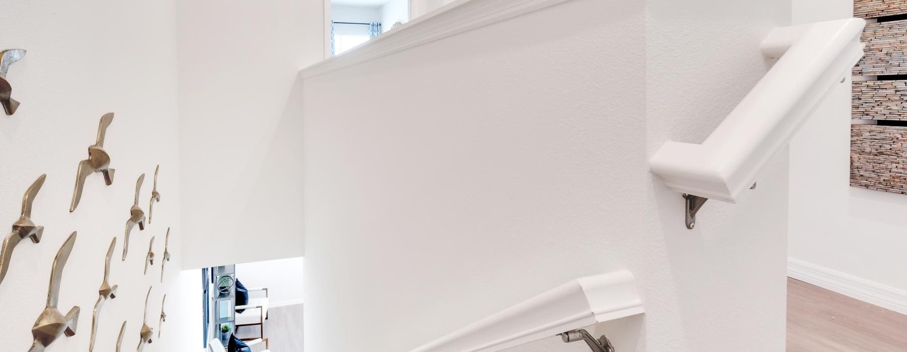 a white bathroom with a sink and a mirror