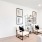 a living room with a white wall