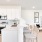 a kitchen with white cabinets